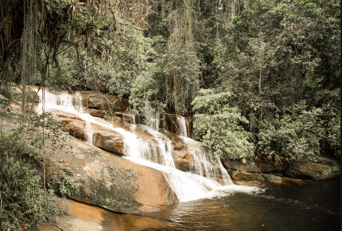 A waterfall running over the rocks in the Atlantic Forest
